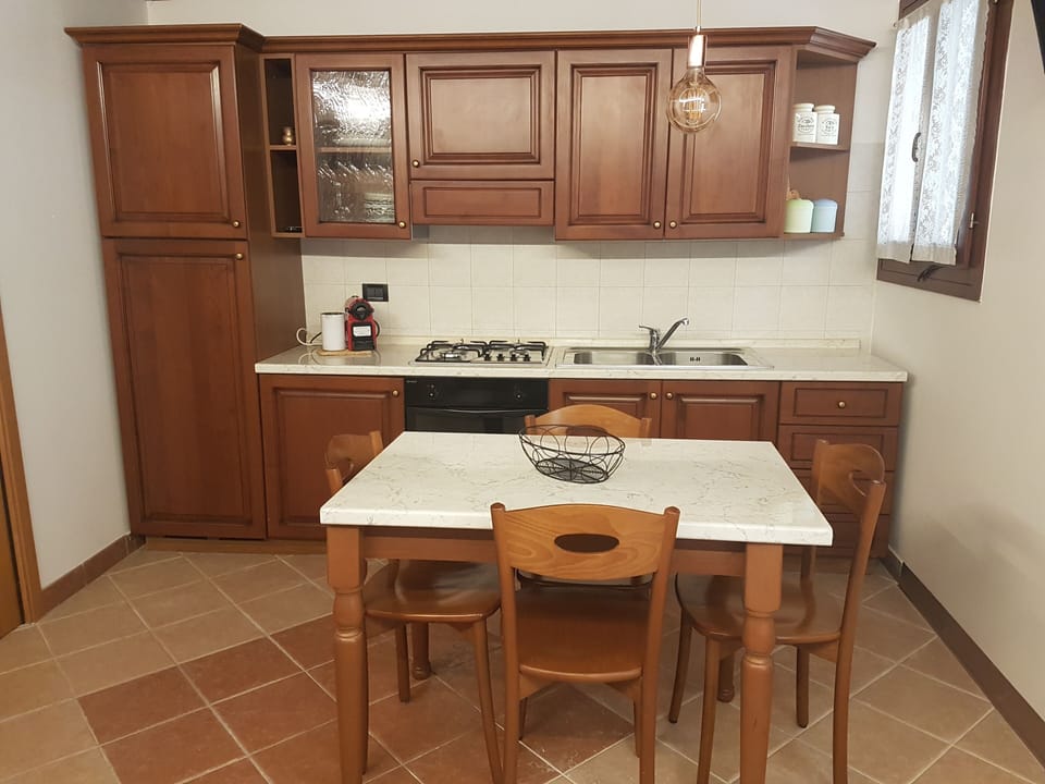 Apartment, 1 Bedroom | Private kitchen | Full-size fridge, microwave, oven, stovetop