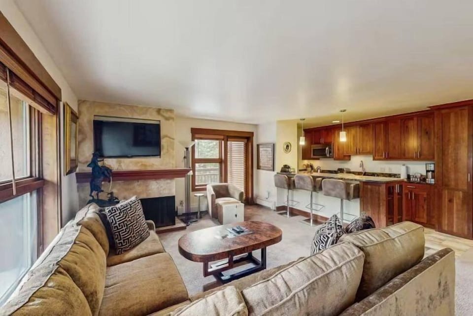 Condo (Vail Lion Square 1 Bed Gold) | Living room | Flat-screen TV, fireplace