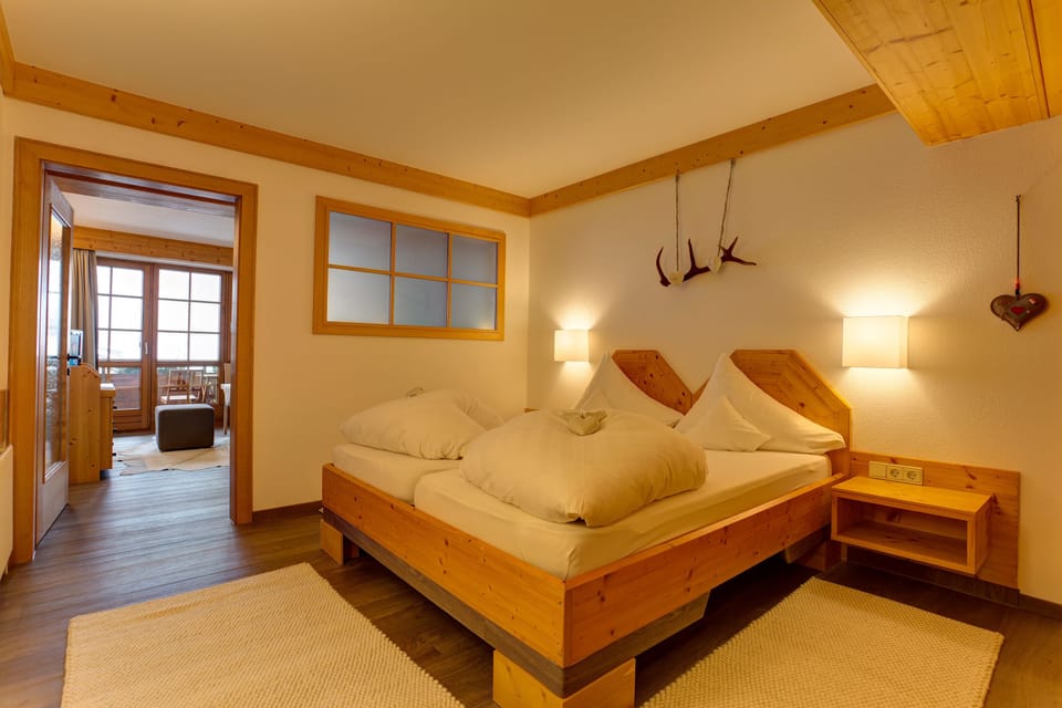 Suite, Balcony, Mountain View (Dorfplatz) | Minibar, in-room safe, desk, iron/ironing board