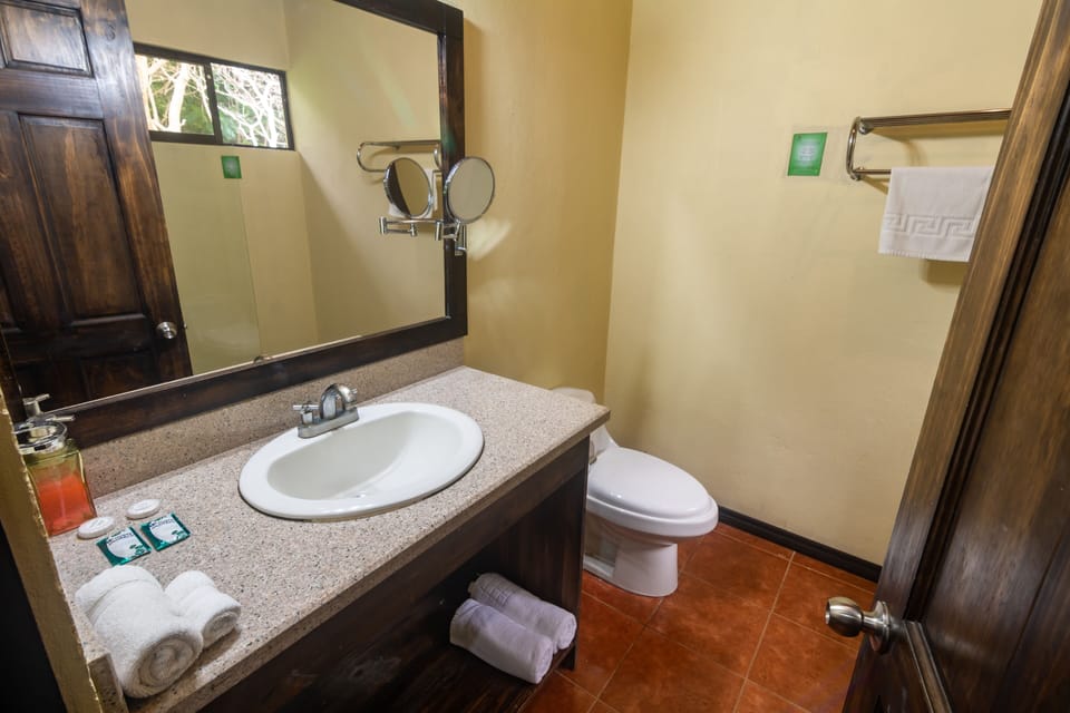 Standard Room, 2 Double Beds, Garden View | Bathroom | Shower, towels, shampoo