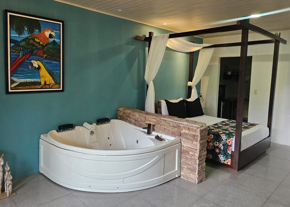 Superior Suite, 1 Queen Bed, Hot Tub, Hill View | Hypo-allergenic bedding, pillowtop beds, minibar, in-room safe