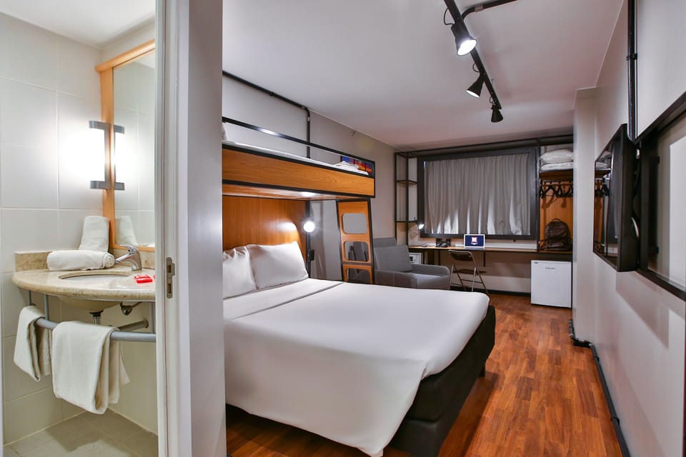 Standard Room, Multiple Beds | Minibar, in-room safe, desk, soundproofing