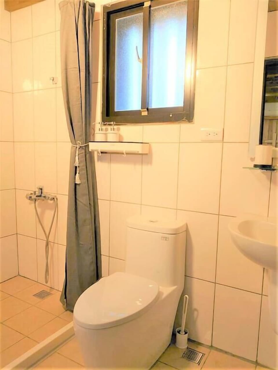 Shower, free toiletries, hair dryer, slippers