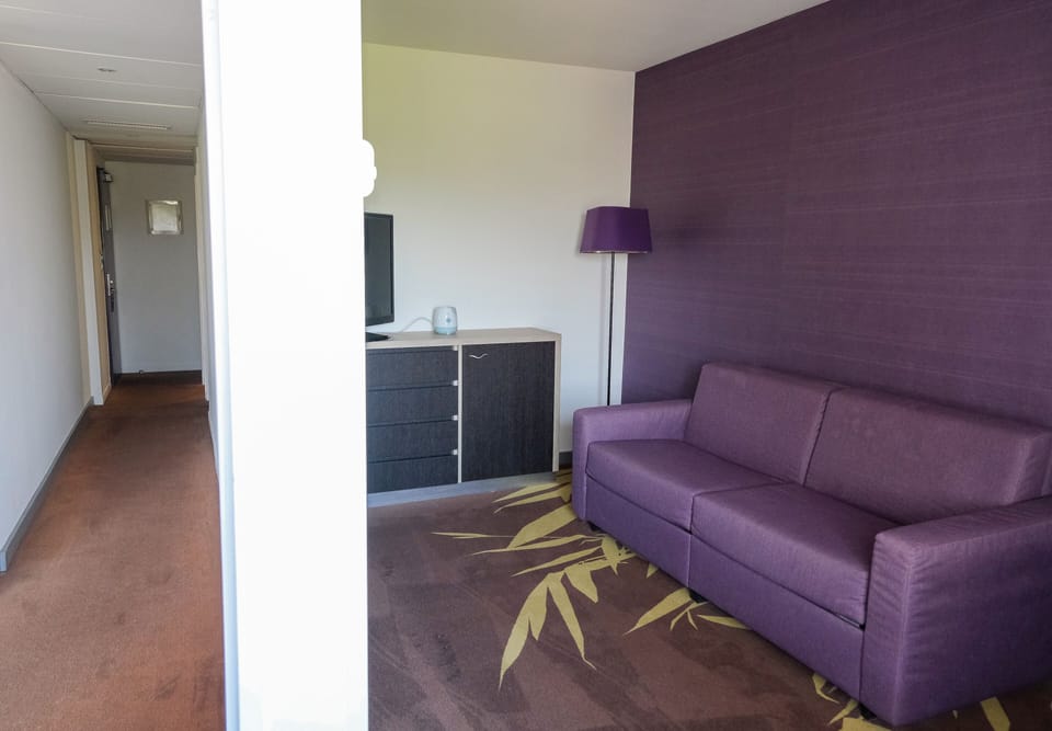 Family Suite | Minibar, in-room safe, individually decorated, individually furnished