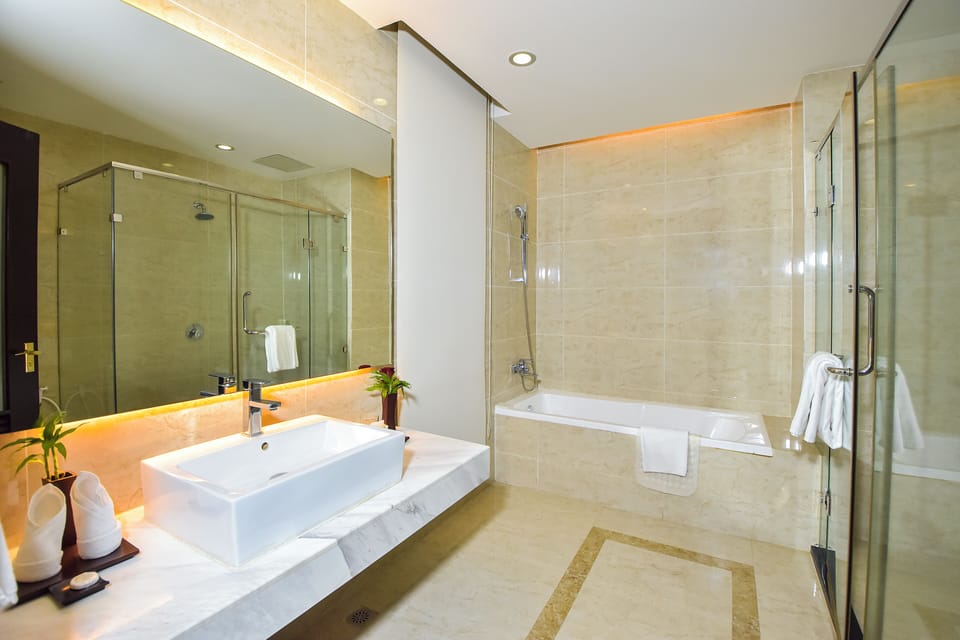 Designer toiletries, hair dryer, bathrobes, slippers