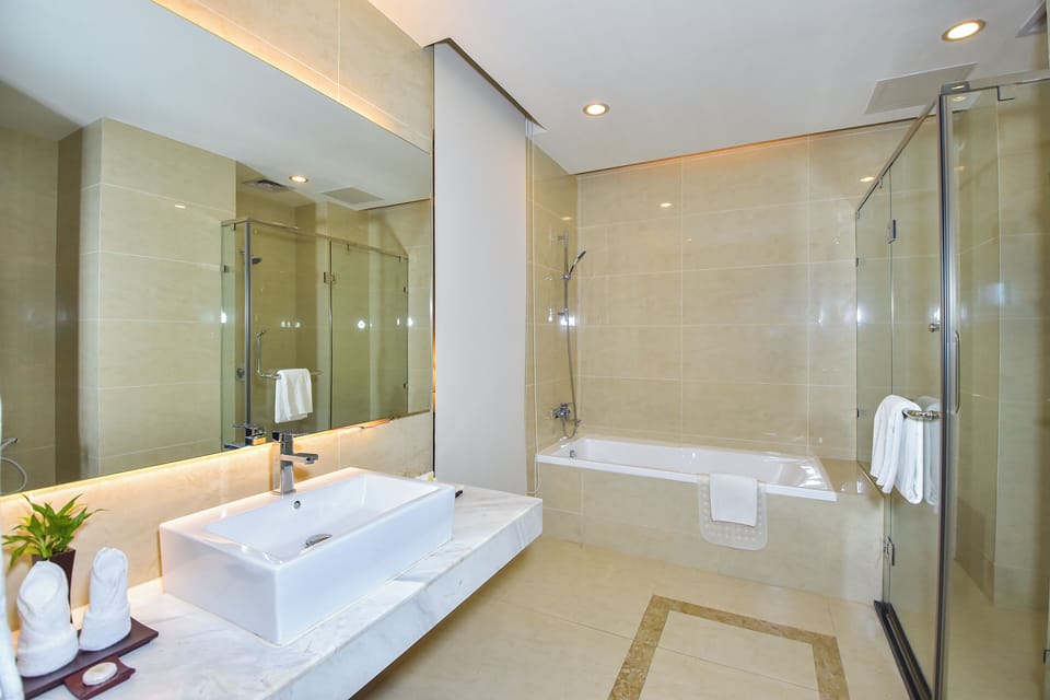 Designer toiletries, hair dryer, bathrobes, slippers