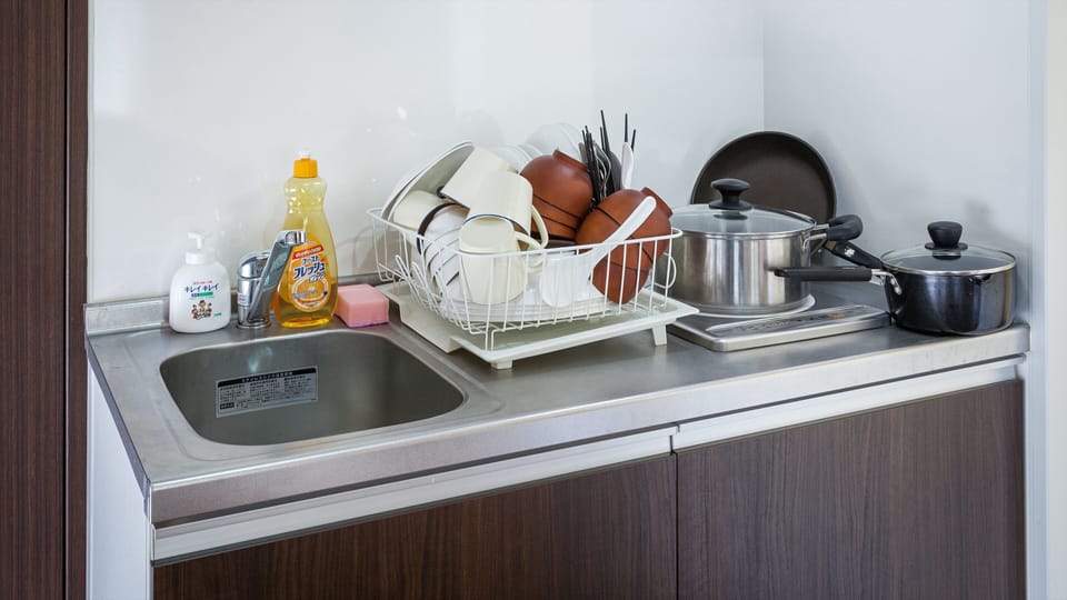 Quadruple Room | Private kitchen | Fridge, microwave, electric kettle