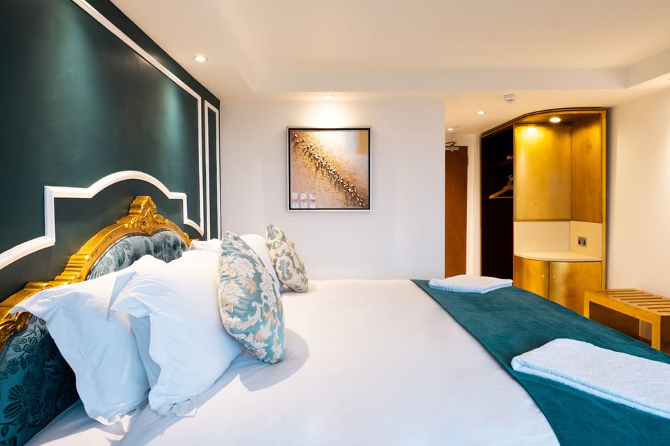 Executive Double Room | Desk, blackout drapes, iron/ironing board, free WiFi