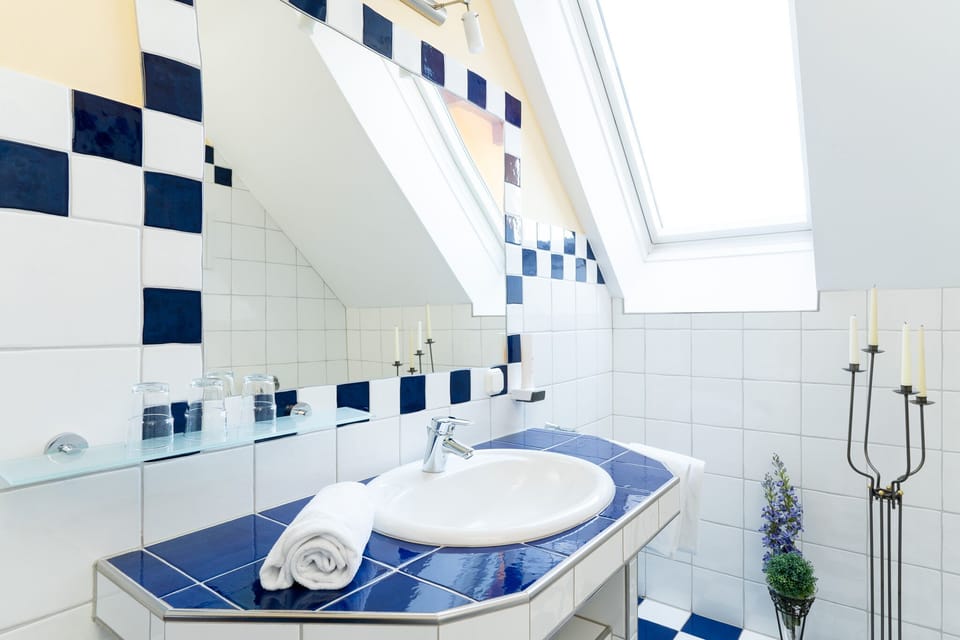 Comfort Duplex | Bathroom | Shower, hair dryer, bathrobes, towels