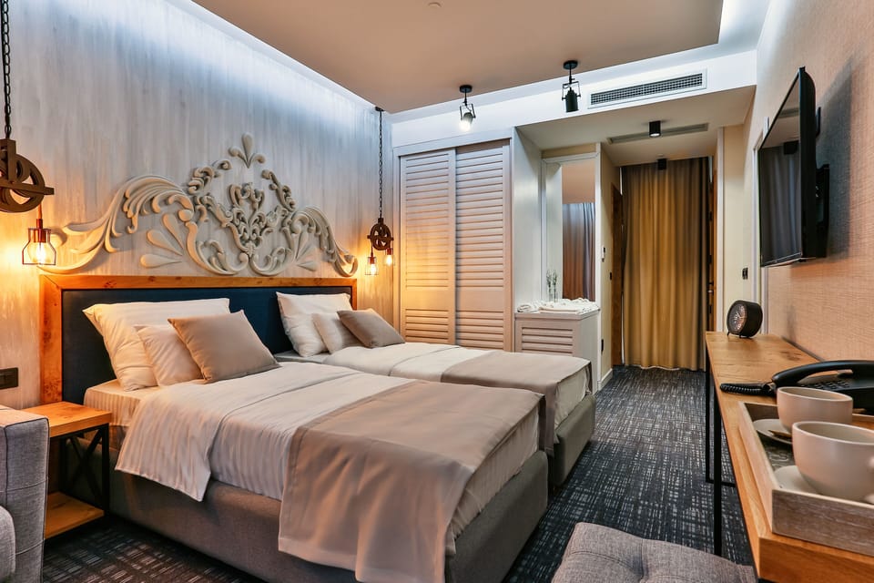 Egyptian cotton sheets, premium bedding, minibar, in-room safe