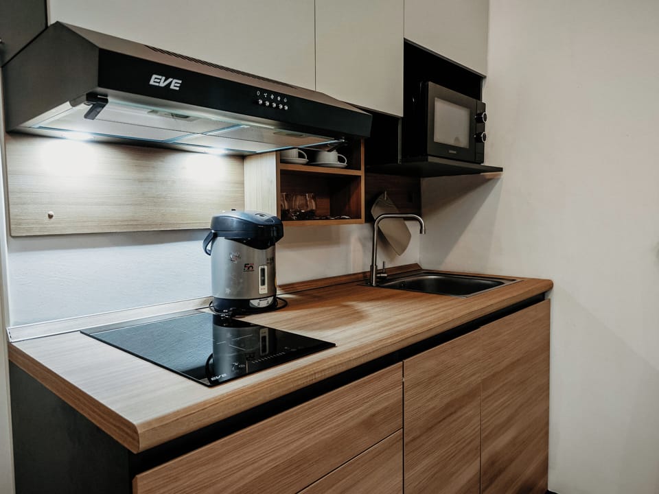 Deluxe Suite | Private kitchen | Fridge
