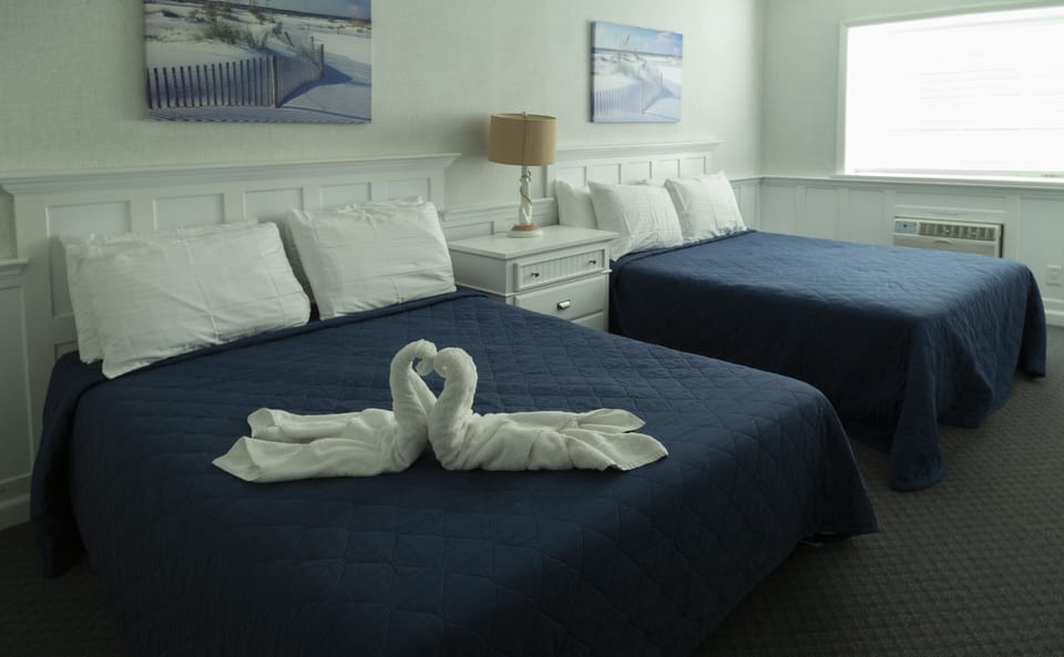 Classic Room | Down comforters, pillowtop beds, laptop workspace, blackout drapes