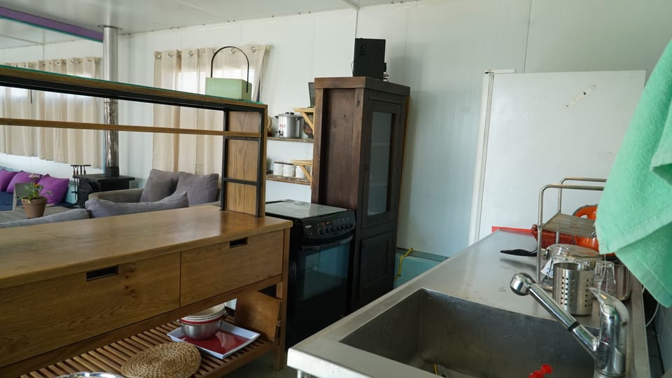 Grand Cabin, Multiple Beds | Private kitchen | Stovetop, coffee/tea maker, electric kettle, cookware/dishes/utensils