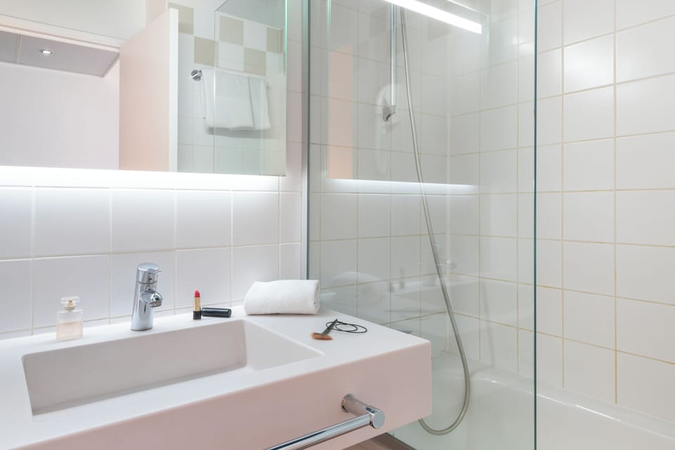 Eco-friendly toiletries, hair dryer, towels, soap