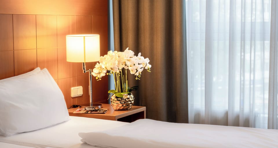Desk, blackout drapes, iron/ironing board, rollaway beds