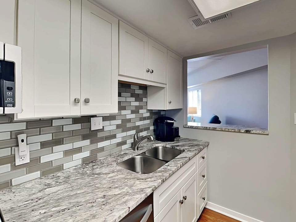Condo, 1 King Bed with Sofa bed, Balcony, Garden View (Forest Beach Villa 306 - No Pets Allowed) | Private kitchen | Fridge, microwave, oven, stovetop