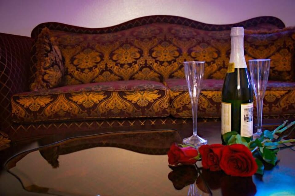 Standard Room, 1 King Bed | Living area | TV