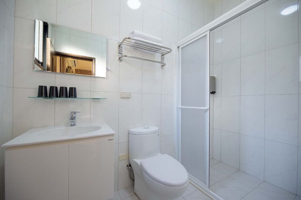 Shower, free toiletries, hair dryer, slippers