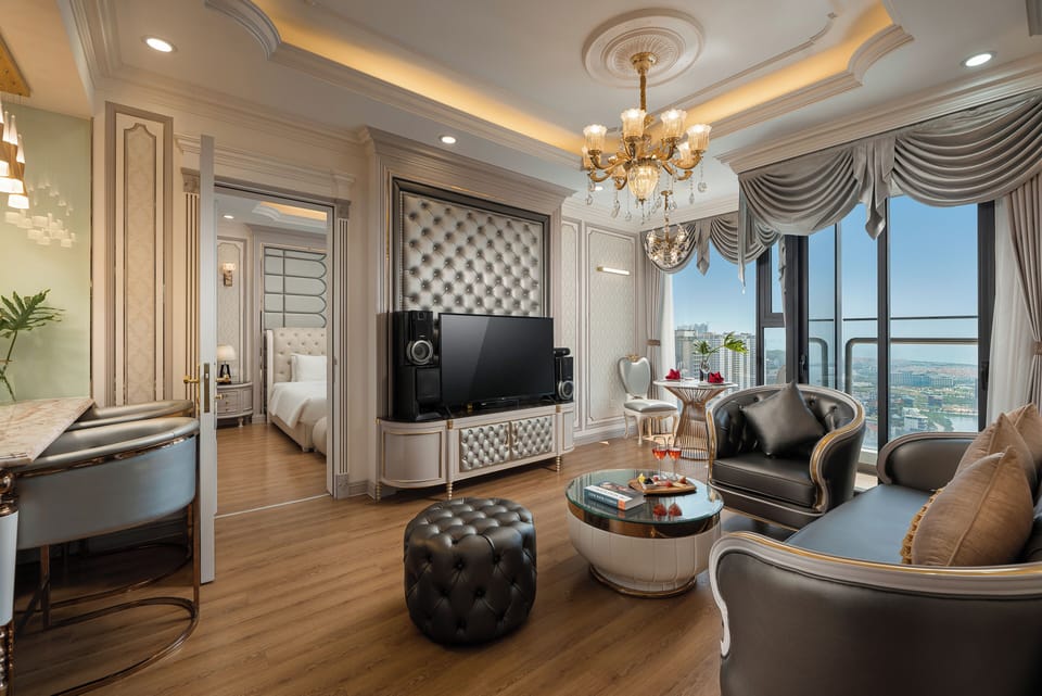 Luxury Suite, City View | Minibar, in-room safe, blackout drapes, iron/ironing board