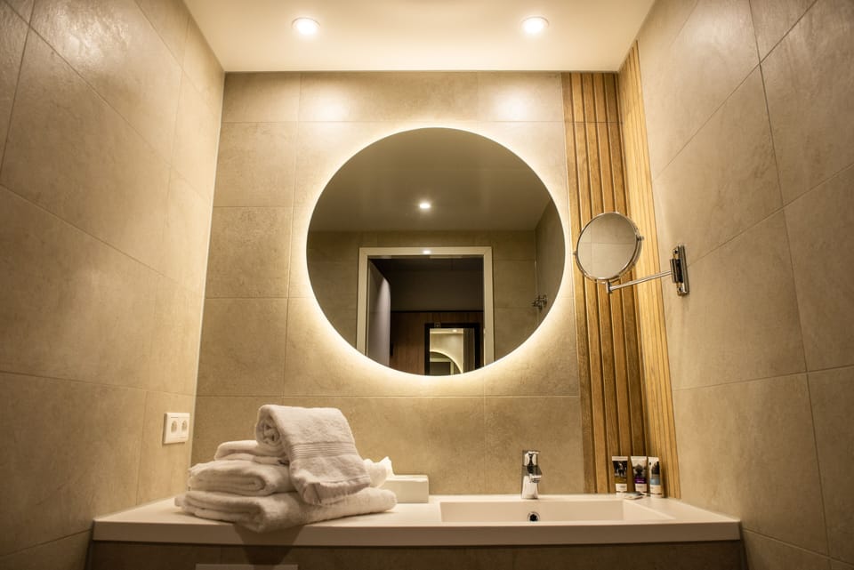 Shower, rainfall showerhead, eco-friendly toiletries, hair dryer
