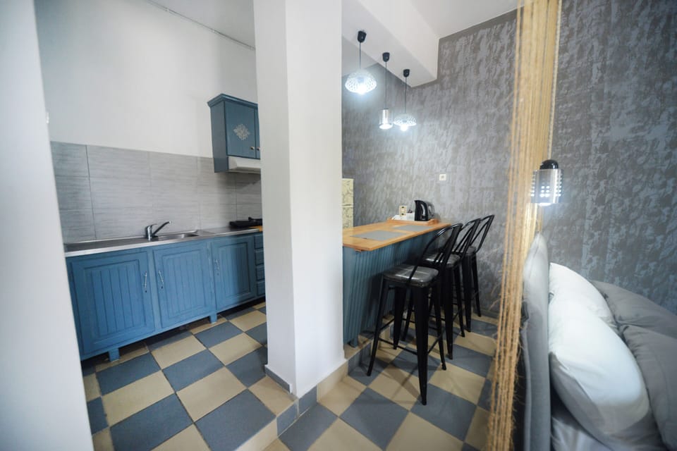 Junior Studio Suite, 1 Bedroom, Sea View | Private kitchen | Full-size fridge, coffee/tea maker, electric kettle