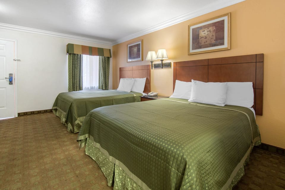 Standard Room, 2 Queen Beds, Non Smoking | Desk, laptop workspace, blackout drapes, iron/ironing board