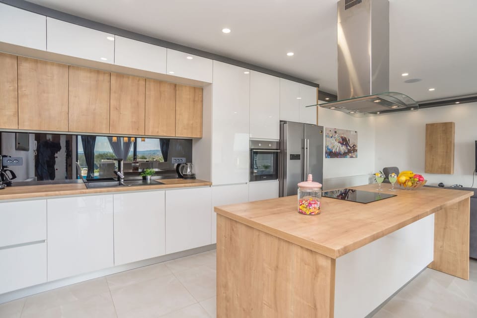 Villa, 4 Bedrooms, Accessible, Smoking | Private kitchen | Microwave, dishwasher, coffee/tea maker