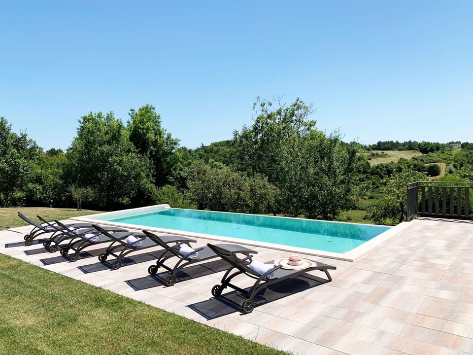 Seasonal outdoor pool, sun loungers