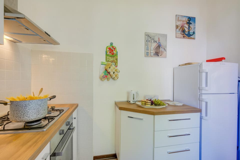 Family Apartment, 3 Bedrooms, 2 Bathrooms, Sea Facing (La Fresia - Focette 100m from sea) | Private kitchen | Coffee/tea maker, full-size fridge, oven, stovetop