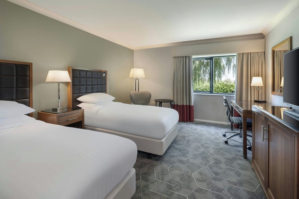 Deluxe Twin Room, 2 Twin Beds | Premium bedding, down comforters, pillowtop beds, in-room safe