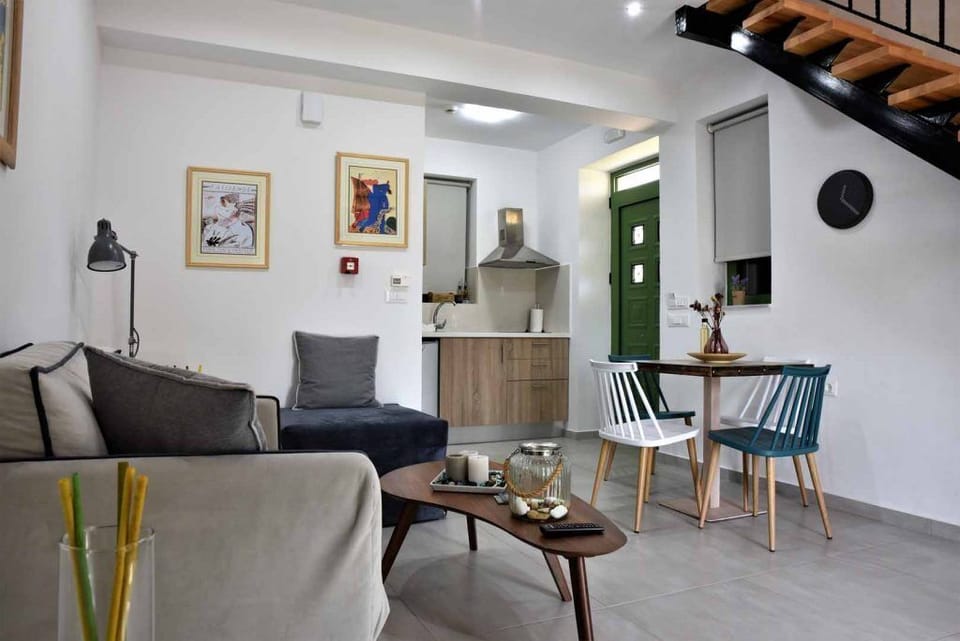 Romantic Double Room | Living area | Flat-screen TV