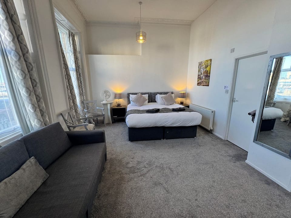 Gold Seaview Double + Sofa Bed | Individually decorated, individually furnished, iron/ironing board