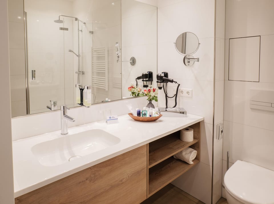 Hair dryer, slippers, towels, soap