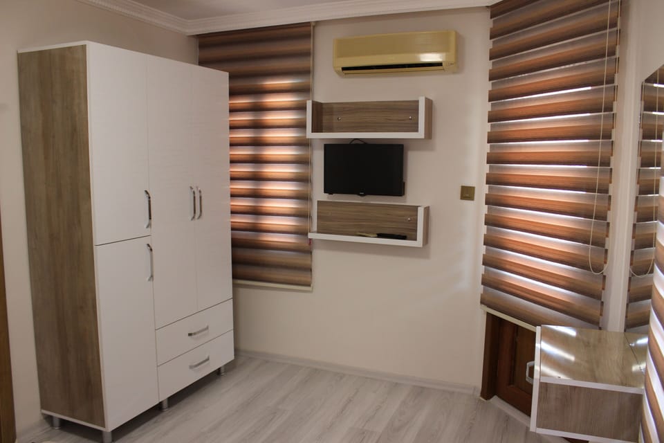 Deluxe Duplex | Living area | 40-inch LED TV with satellite channels, TV