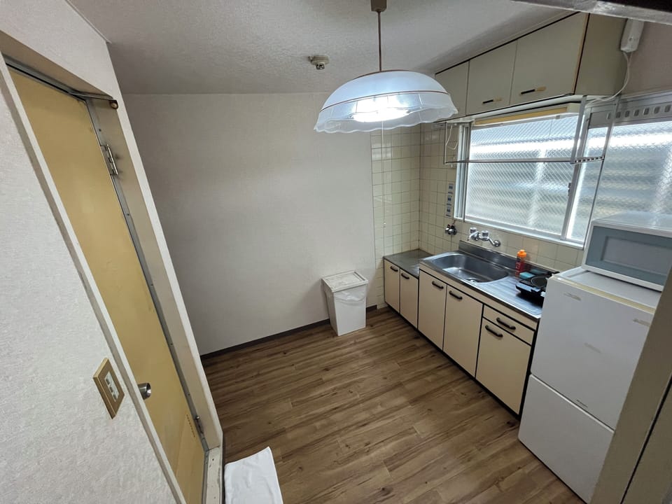 Apartment, 2 Bedrooms | Private kitchen | Fridge, microwave, stovetop, cookware/dishes/utensils