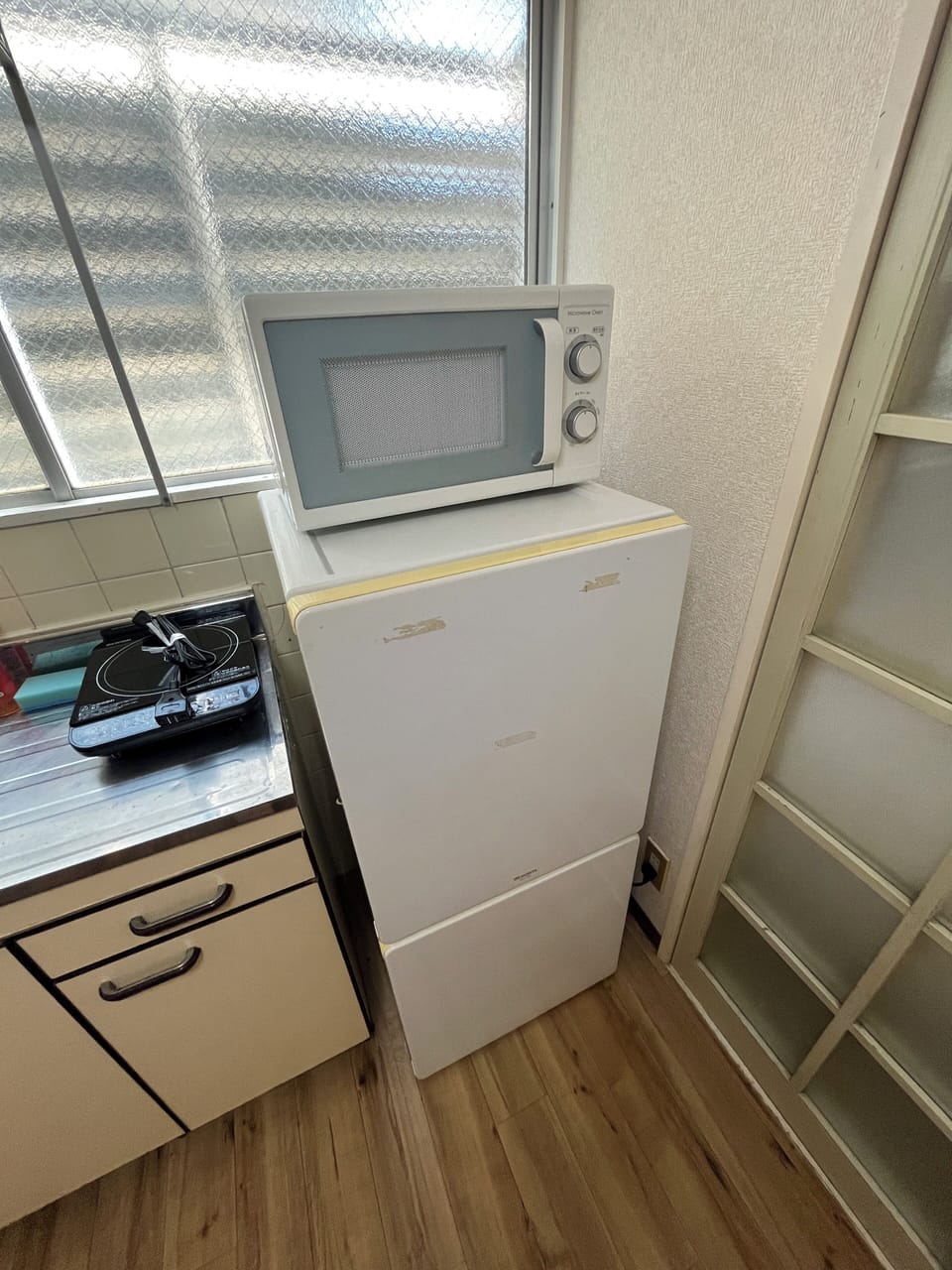 Apartment, 2 Bedrooms | Private kitchen | Fridge, microwave, stovetop, cookware/dishes/utensils
