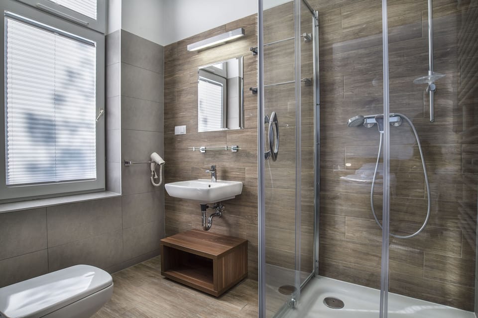 Shower, bathrobes, towels