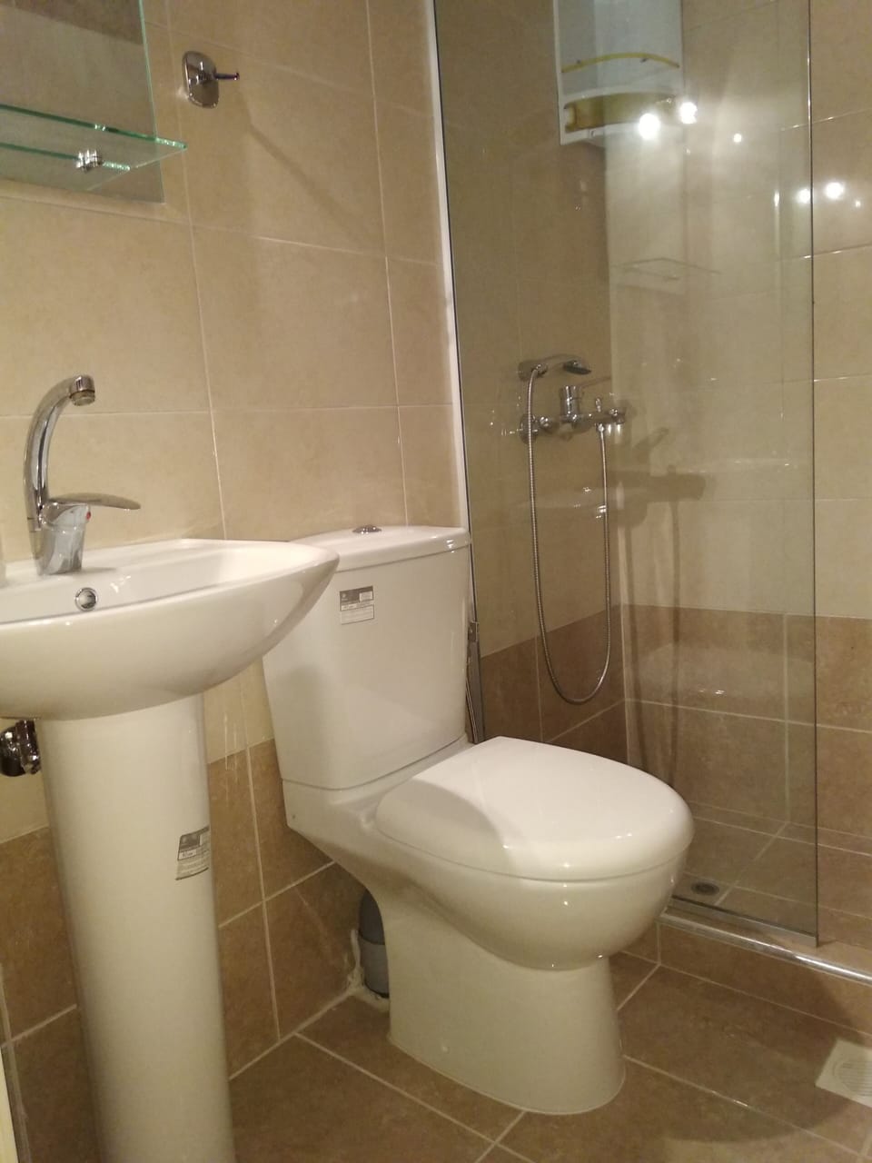 Shower, towels, toilet paper
