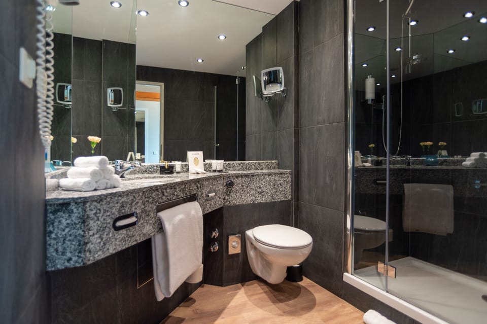 Suite, 1 King Bed, 2 Bathrooms, Garden Area | Bathroom | Separate tub and shower, rainfall showerhead, free toiletries