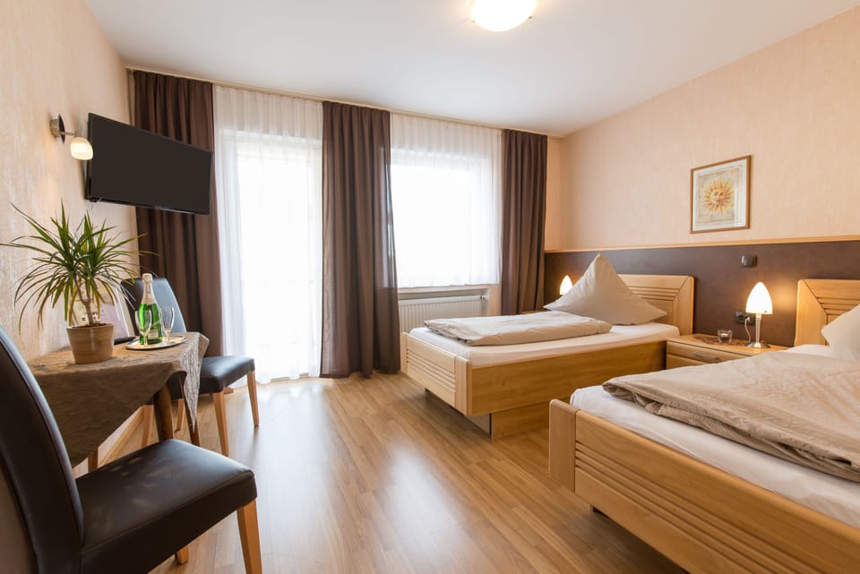 Hypo-allergenic bedding, in-room safe, desk, laptop workspace