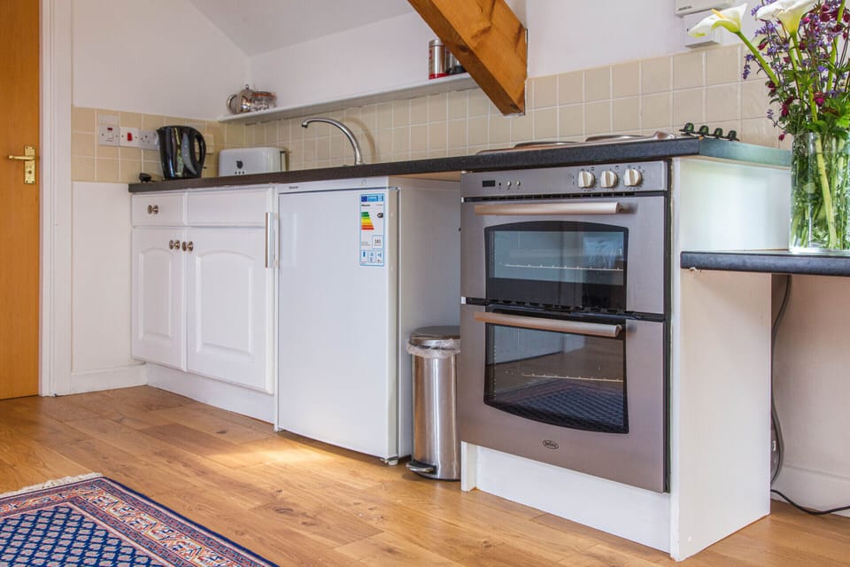 Studio, Ensuite (The Loft-2 Bedroom Annexe) | Private kitchen | Highchair