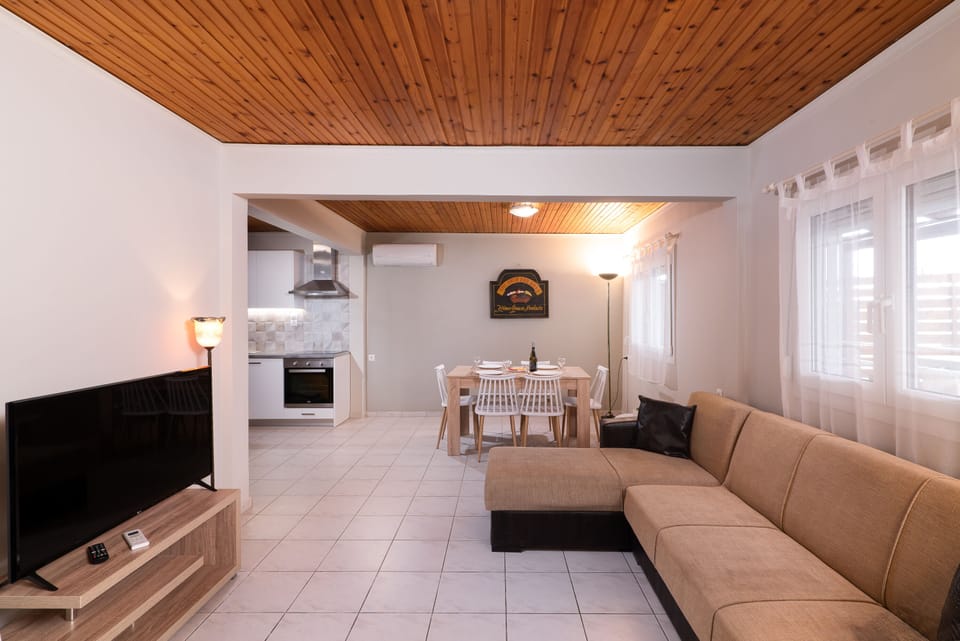 Deluxe House, 3 Bedrooms, Sea View | Living area | Flat-screen TV, fireplace