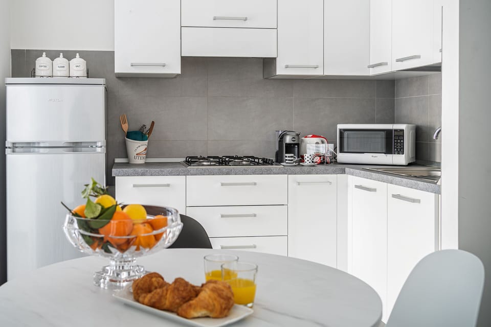 Apartment, 3 Bedrooms | Private kitchen | Dining tables