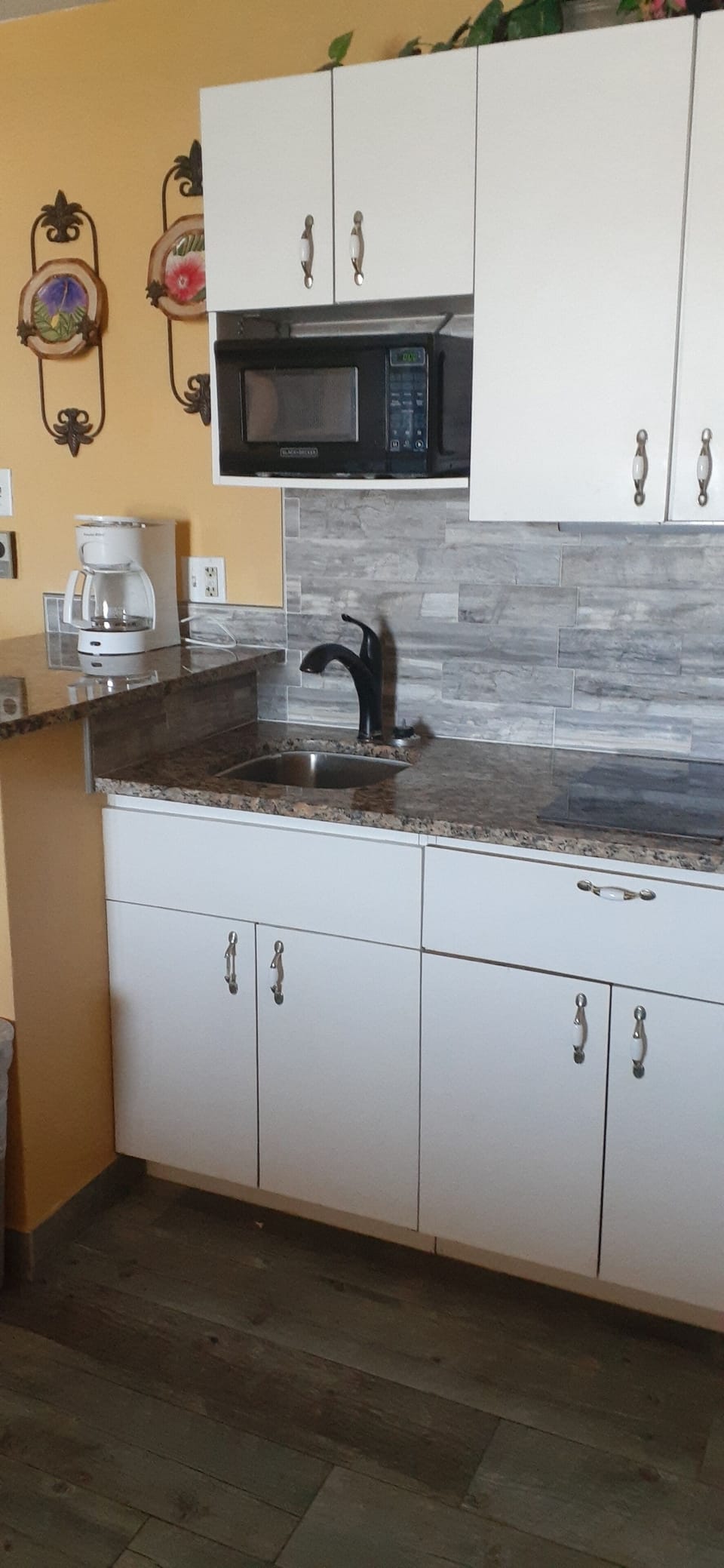 Fridge, microwave, coffee/tea maker, toaster