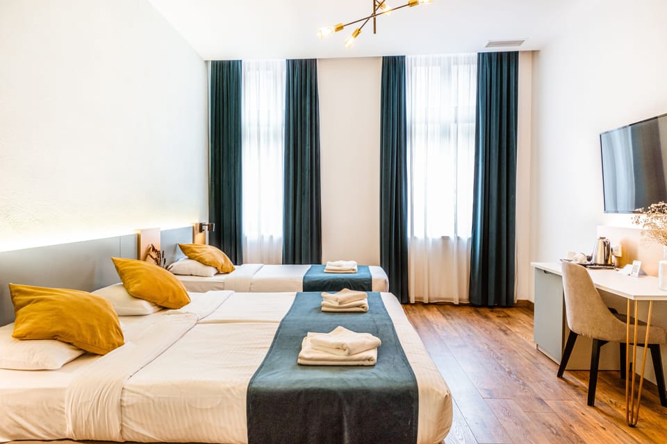 Triple Budget Room  Nicolae Balcescu 13 | Premium bedding, memory foam beds, minibar, in-room safe