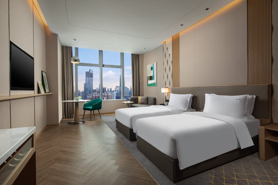 Premium bedding, down comforters, minibar, in-room safe