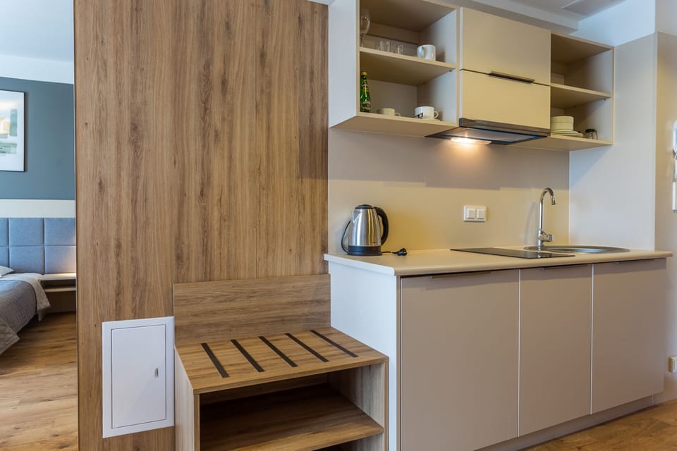 Superior Studio Suite | Private kitchen | Mini-fridge