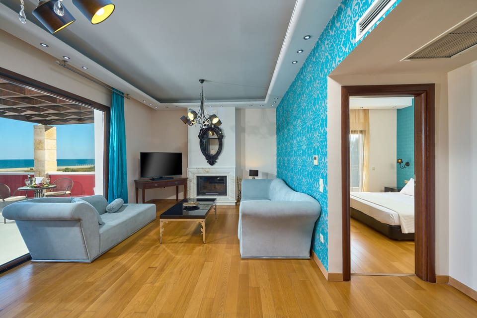 Grand Suite | Living area | Flat-screen TV