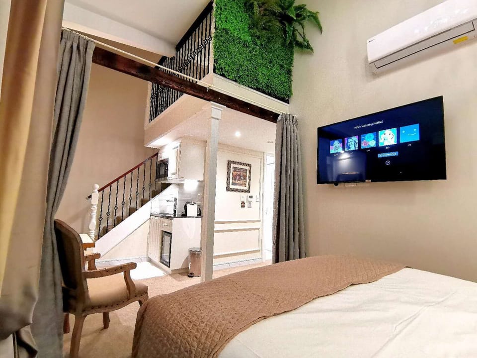 Luxury Class Duplex Suite | Premium bedding, down comforters, Select Comfort beds, in-room safe