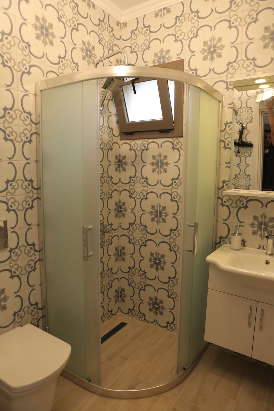 Shower, free toiletries, hair dryer, slippers
